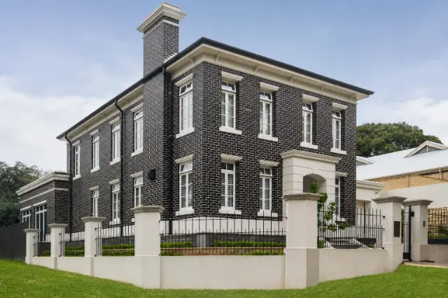 Custom timber windows throughout a two-storey home.